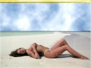 a hott babe on a hot beach ;)
-800x600